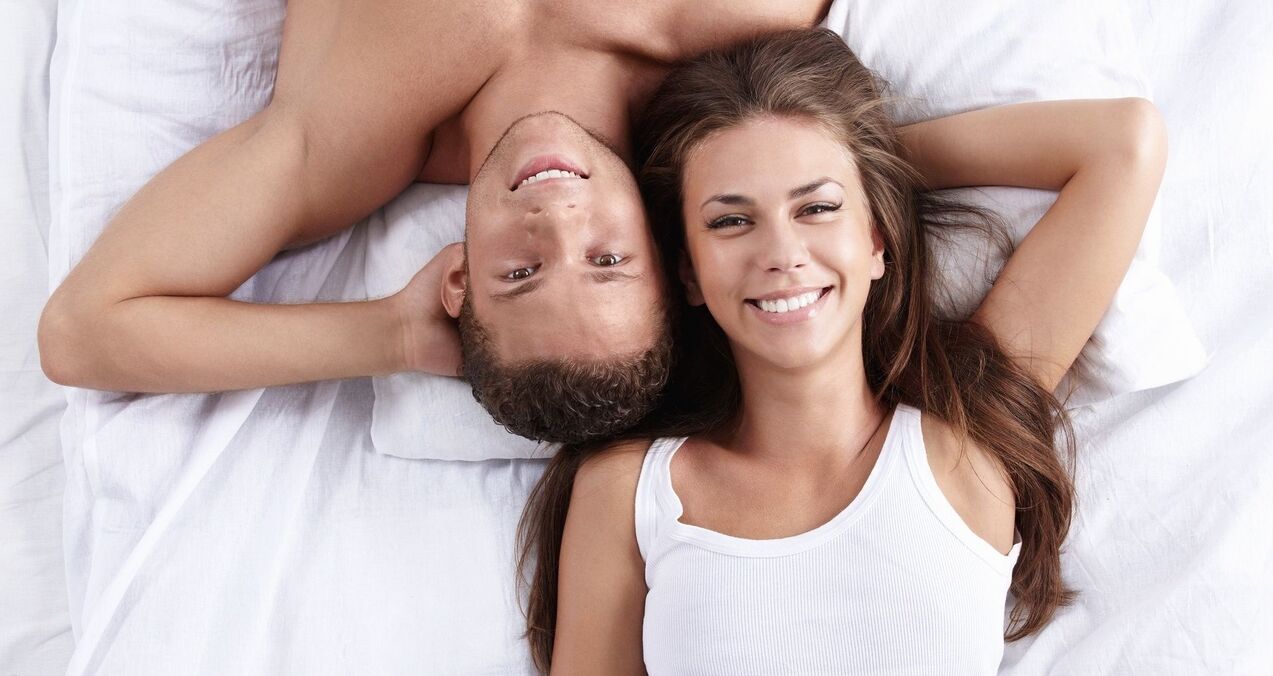 a woman in bed with a man who has increased potential